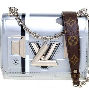 HIGHLY COLLECTIBLE LOUIS VUITTON SPACE BAG TWIST (collector’s item)
